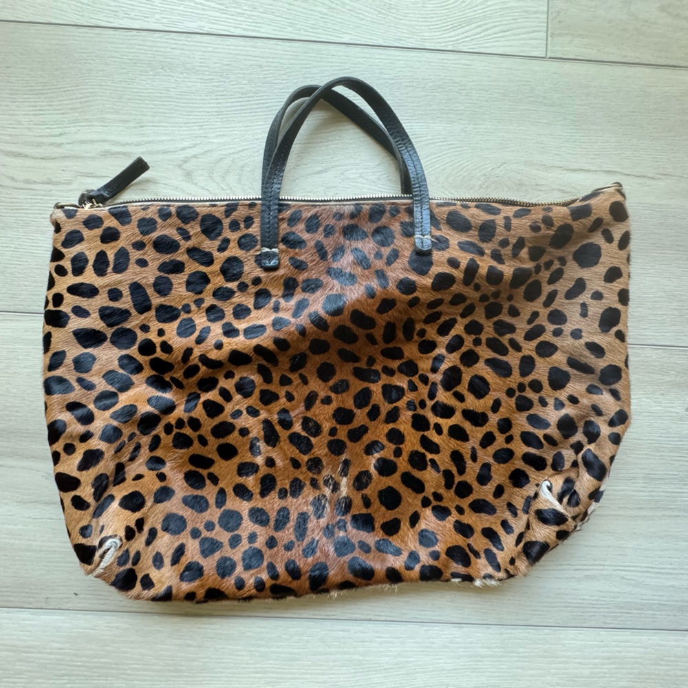 Clare V Cheetah hair on hide Top Handle Tote Bag with Denim interior lining.